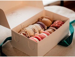 Sova Macaron лого