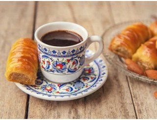 The Pink Elephant  Coffee & Bakery лого