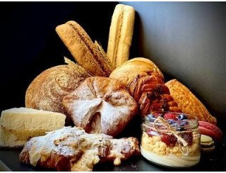 The Плюшка лого