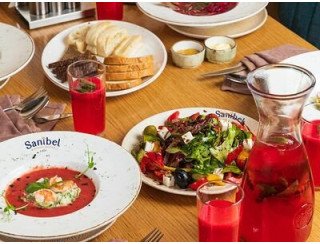 Sanibel cafe лого