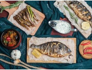 Первый рыбный ресторан Солнечный камень лого